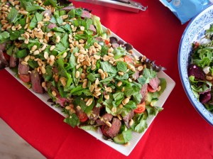 Colorful fresh salad with greens, seeds, and vegetables served on a plate